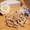 100 trombones photo en bois naturel de 35 mm.