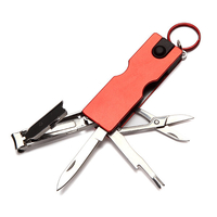 8 en 1 Multitool Outil de manucure Coupe-ongles Porte-clés Accessoires Lime à ongles Cleaner LED Lampe de poche