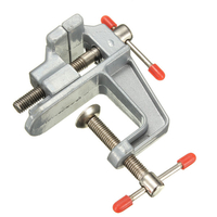 Aluminium miniature petite pince sur la table outil banc étau 