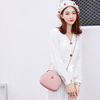 Bakeey Femmes Loisirs Sac à bandoulière en cuir PU Petit sac rond Sac à bandoulière avec trou pour écouteurs