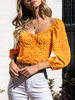 Blouse fleurie à manches longues et bouffantes 100% polyester