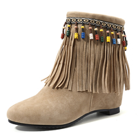 Bottines zippées à grande taille avec pompons