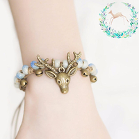Bracelet à breloques cerfs Vintage Ethnique Petite cloche Corde de cire à perles Bracelet à la main unisexe Jeweley