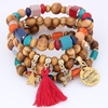 Bracelet en couches de perles multicolores mélangées avec des étoiles papillon de Bohème pour les femmes