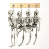 Échappement squelettique de 15 cm Maison hantée Décoration de crâne Halloween Suspension de squelettes en plastique Tric