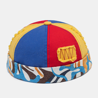 Collrown unisexe trou cassé couleur couture crâne casquette Graffiti motif décontracté réglable sans bord bonnet proprié