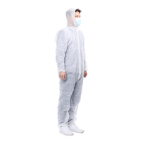 Combinaisons blanches jetables Costume de pulvérisation de poussière Vêtements non tissés