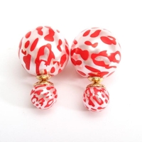 Doubles léopard côté clous boucles d
