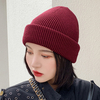 Femmes acrylique hiver chaud coupe-vent bridage bonnet en laine de couleur unie bonnet tricoté