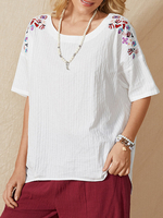 Femmes broderie florale col rond ourlet irrégulier T-shirts décontractés lâches