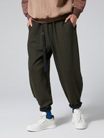 Hommes loisirs rayures verticales taille élastique conique pantalon de couleur unie