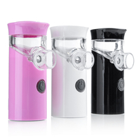 Humidificateur tenu dans la main ultrasonique portatif adulte nébulise la beauté hydratante USB