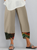 Imprimé ethnique patchwork taille élastique poche latérale pantalon ourlet irrégulier pour les femmes