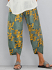 Imprimé floral taille élastique lâche poche latérale causale irrégulière ourlet pantalon