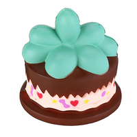 Jouet de rebond ascendant lent de gâteau au chocolat 9CM de plante de Squishy avec le décor de cadeau demballage