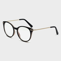 Lunettes de soleil extérieures décontractées de personnalité de cadre en métal de forme ronde de femmes