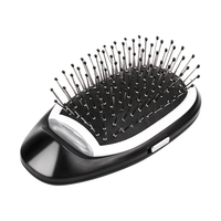 Mini peigne gonflable de brosse à cheveux du massage 3D à emporter ionique électrique portatif de brosse à cheveux