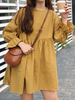 Mini robe plissée jaune à manches longues col rond uni