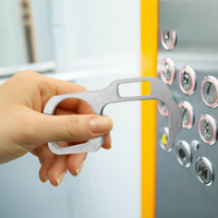 Ouvre-porte à main Porte-clés portable pour ouvrir les portes Appuyez sur le bouton de lascenseur Évitez de toucher