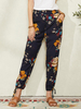 Pantalon à revers à cravate bohème imprimé floral pour femme avec poche