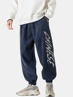 Pantalon à revers élastique en velours côtelé à imprimé lettre pour homme avec poche