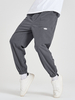 Pantalon ample à revers en velours côtelé de couleur unie pour hommes