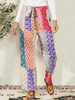 Pantalon ample de style ethnique ceinturé à imprimé color block pour femmes