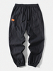 Pantalon avec cordon de serrage à la cheville élastique avec coutures pour hommes