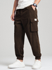 Pantalon cargo ample à cordon de serrage en velours côtelé appliqué de couleur unie pour hommes