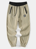 Pantalon cargo ample avec cordon de serrage à la taille pour homme