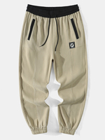 Pantalon cargo ample avec cordon de serrage à la taille pour homme