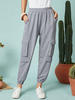 Pantalon cargo décontracté pour femmes de couleur unie à taille élastique
