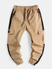 Pantalon décontracté à patchwork de couleur unie pour homme avec poche