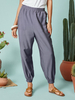 Pantalon décontracté à poche à taille élastique de couleur unie pour femmes