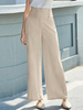 Pantalon décontracté à taille haute avec bouton à poche unie