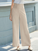 Pantalon décontracté à taille haute avec bouton à poche unie