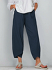 Pantalon décontracté à taille élastique de couleur unie avec poches