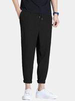 Pantalon décontracté à texture de poche à cordon de serrage pour hommes en coton