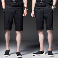 Pantalon décontracté droit cinq pantalons pour hommes à la mode Youth à section mince Pantalon court en couleur unie