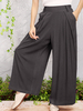 Pantalon de couleur unie taille élastique à jambes larges avec poches latérales