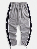 Pantalon de jogging avec cordon de serrage et patchwork sur le côté pour homme
