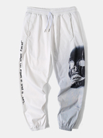 Pantalon de jogging avec poche à cordon de serrage imprimé Street Head pour hommes
