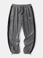 Pantalon de jogging décontracté en velours côtelé pour hommes avec poches latérales à cordon de serrage