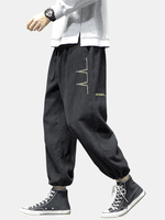 Pantalon de jogging en velours côtelé brodé pour homme avec poche