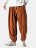 Pantalon de jogging lâche de couleur unie en velours côtelé pour homme avec poche