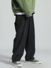 Pantalon de manchette réglable lâche de cordon de velours pour hommes avec des cordons de tirage
