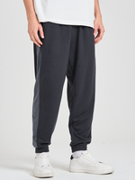 Pantalon de survêtement ample à cordon de serrage à rayures latérales pour hommes avec poche