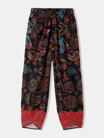 Pantalon de taille élastique à revers irrégulier à motif ethnique pour femmes avec poche
