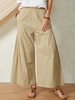 Pantalon en coton à jambe évasée décontractée à taille élastique avec poche de couleur unie