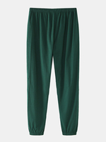 Pantalon en coton pour hommes de couleur unie décontracté à la maison en vrac mince élastique mi-taille